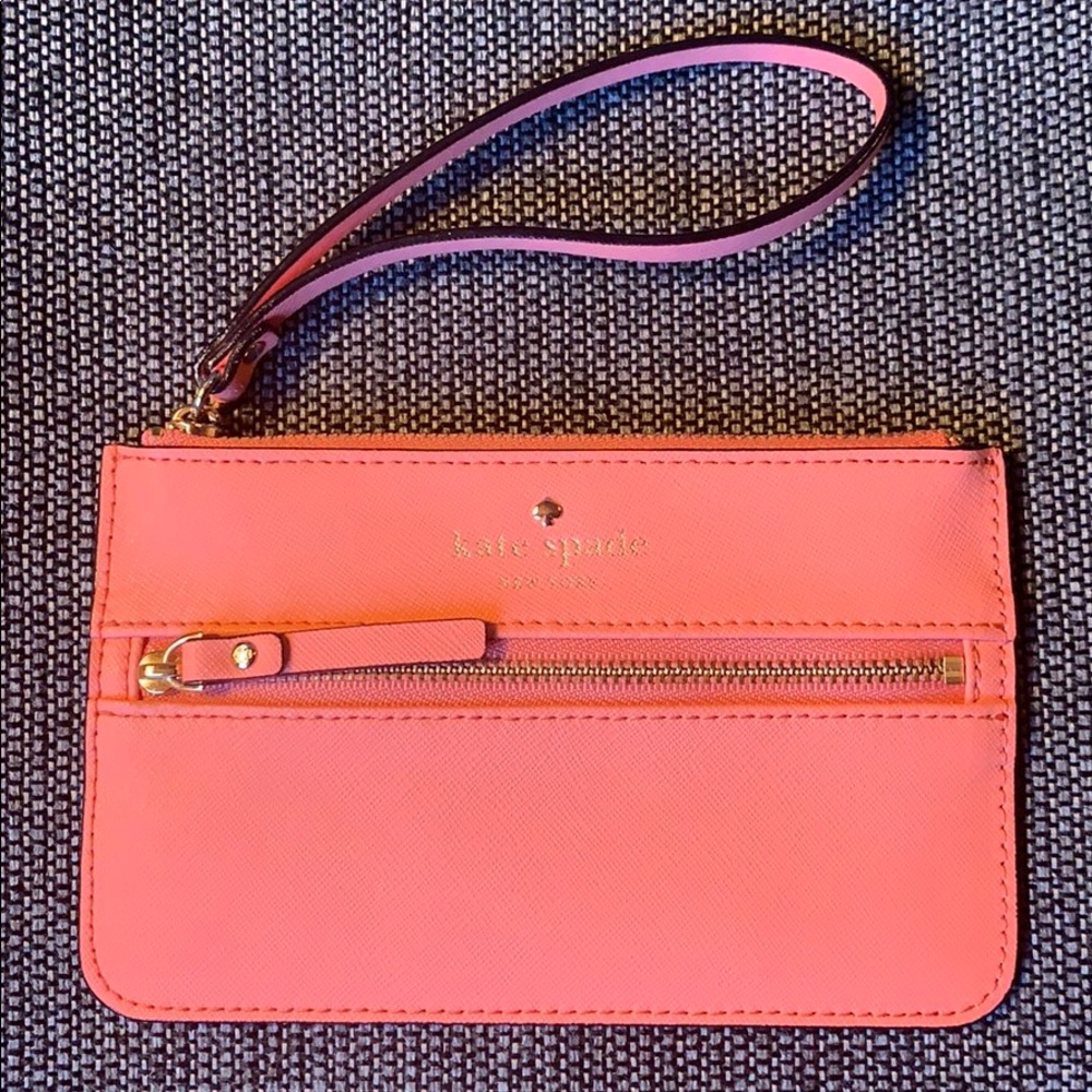 Kate Spade Wristlet in bright coral orange color